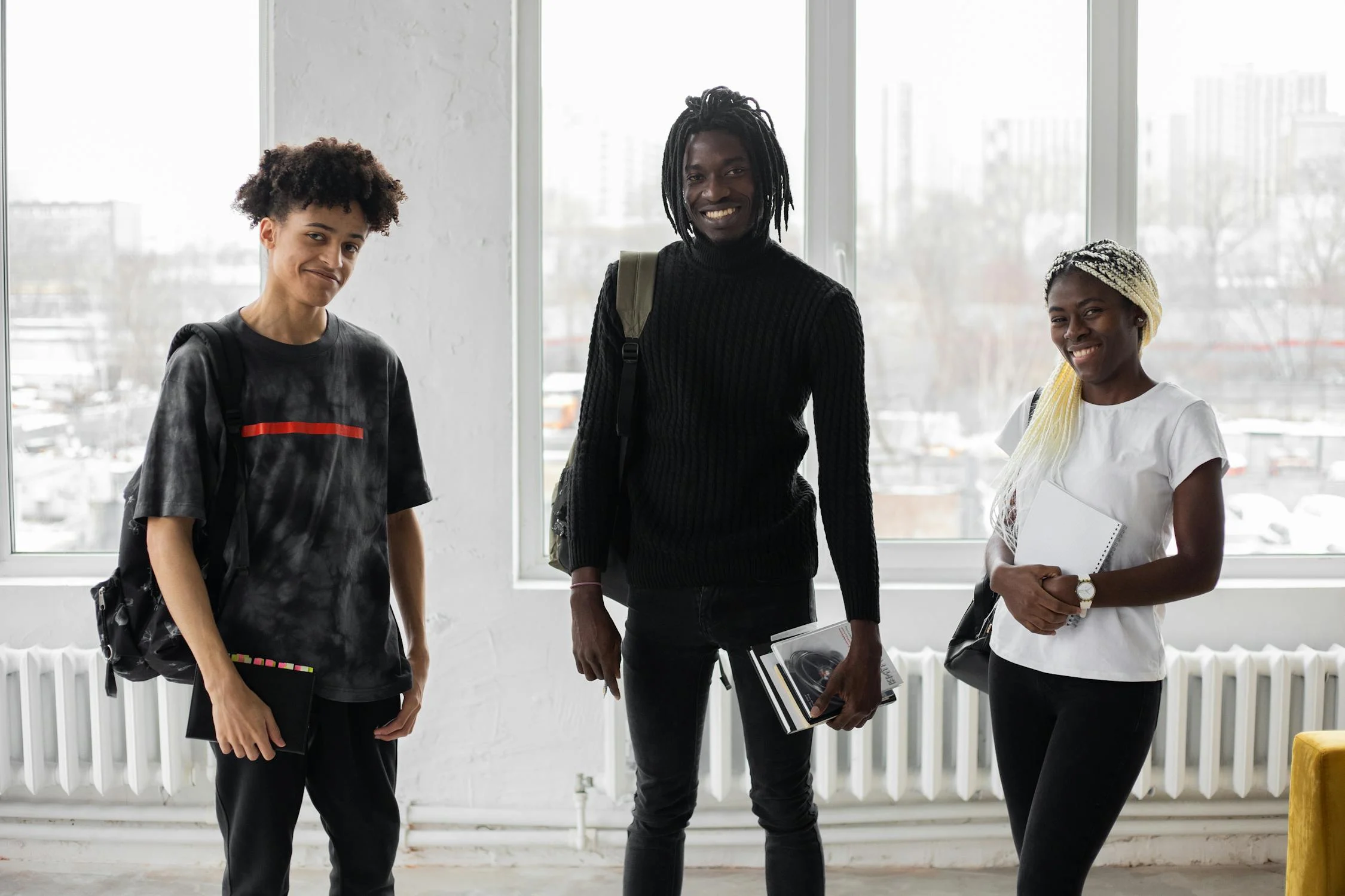 Happy Black Students Standing in Classroom